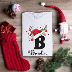 Christmas Custom Name Matching T-Shirt Gift, Custom Family Christmas Shirt, Personalized Christmas Couple Shirt, Christmas Group Shirt Step into our exclusive collection of stylish and comfortable t-shirts, tailored for football enthusiasts and fashion aficionados alike. DETAILS We take pride in using premium shirts from Bella Canvas and Gildan Soft Style for our prints. *Bella Canvas - Unisex sizing - Lightweight at 4.2 oz. - Available in various compositions including 100% Combed Cotton, Ring-Spun Cotton, and Polyester blends. *Gildan Soft Style - Unisex sizing - Available in different fabric compositions, including Ring Cotton, Polyester blends, and 100% Ring Cotton. HOW TO ORDER YOUR T-SHIRT 1- Explore our captivating product photos. 2- Select your preferred style and color from the dr Name Matching, Matching Christmas Shirts, Couple Shirt, Christmas Custom, Cricut Designs, Group Shirts, Family Christmas Shirts, Christmas Couple, Couple Shirts