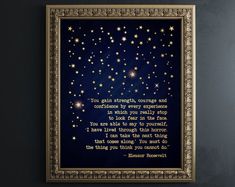 a framed print with the words you give strength, and stars in the night sky