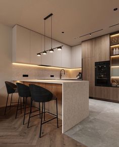 a modern kitchen with an island counter and bar stools