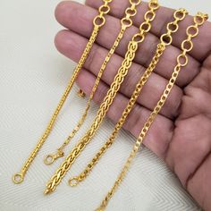 Matt finished 24k Solid Gold covering extensions. These gold Bracelet Extenders can be used to extend your short or long necklace. It can be a replacement for Dori patterns. These are high-quality adjustable extension Chains in antique gold finish. The end-to-end length for most extensions is 8 inches. Gold Chain Bracelet With Extender For Party, Elegant Yellow Gold Chain Bracelet With Extender, Adjustable Yellow Gold Necklace With Extender, Adjustable Gold-tone Bracelet With Extender, Gold 14k Gold-filled Jewelry With Extender, Traditional Bridal Jewelry, Bracelet Extender, Kundan Jewellery Set, Gold Armband