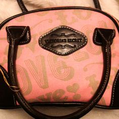 Victoria's Secret Cosmetic Bag Pink & Mint Green Design Pattern Black Leather Handles & Stitching On Bottom Corners For Support New With Tag Gift Just Never Used Versatile Use- Could Be Used For A Purse For Your Daughter (Any Age) 5"X10"X3" Pink Rectangular Victoria's Secret Bag, Vintage Pink Shoulder Bag With Handles, Pink Vintage Shoulder Bag With Handles, Victoria's Secret Pink Shoulder Bag For Shopping, Vintage Pink Satchel For Everyday Use, Casual Pink Victoria's Secret Bags, Pink Pouch Satchel For Errands, Vintage Pink Shoulder Bag For Everyday, Victoria's Secret Pink Pouch Bag