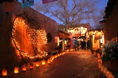 a street with many lit up candles on it