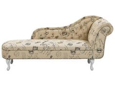 an old fashioned chaise lounger is upholstered with various drawings and designs