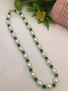 A Gift for someone most adorable for you. Length:20inch Material : brass, pearl,stone. Necklace : 1 Kundan Necklace With Pearl Chain For Gifts, Kundan Necklace With Pearl Chain As Gift, Kundan Pearl Necklace With Round Beads Gift, Green Pearl Necklace For Festivals, Traditional Pearl Chain Beads For Gifts, Traditional Pearl Chain Beads As Gift, Pearl Mala, Jewelry Pakistani, Necklace Indian