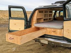 the back end of a pickup truck with its bed in it's cargo compartment