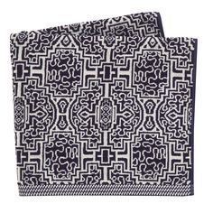 two black and white patterned towels on a white background