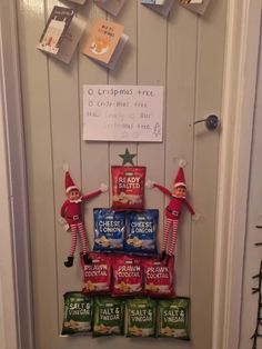 an elf's christmas tree made out of candy bars