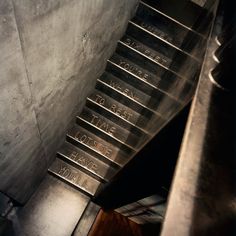 there is a set of stairs that have been engraved with names and numbers on them