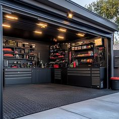 an open garage with lots of tools and equipment in the storage area on the side