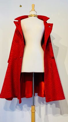 "1960's Vintage Couture Red Brocade Jacket Beautifully made.  Superb craftmanship \"Gordi Fashions, Montreal\" is what reads on the label.  The cut is just gorgeous.  It has an awesome flare that looks like a playful skirt.  Awesome! Dimensions: Size:  Small Shoulder to shoulder: 40 cm Underarm to underarm:  47 cm Length from neck to bottom: 96cm We bought this gorgeous jacket from the daughter of a Canadian textile tycoon in Montréal, Canada.  She told me that this was her favorite jacket and brought her many beautiful memories just looking at it!  I bought several dresses from her but chose only this one coat for you!" Fitted A-line Party Outerwear, Vintage Red Outerwear For Evening, Vintage Fitted Cape Outerwear, Fitted Vintage Red Outerwear, Red Fitted Outerwear For Evening, Fitted Cape-style Party Outerwear, Fitted Cape Outerwear For Party, Fitted Party Cape Outerwear, Brocade Coat