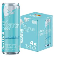 a can of red bull winter edition energy drink next to a box