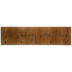 a wooden sign with writing on it that says, the something we are hung up