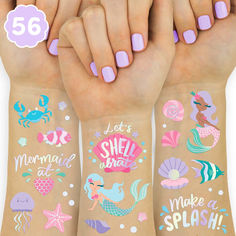 three girls'hands with mermaid temporary tattoos on them