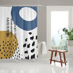 a bathroom with a shower curtain, stool and potted plant on the floor in front of it