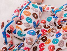 Generous 45" x 45" swaddles. They can be used as a swaddle blanket, stroller cover, nursing cover-up or just for snuggling up with. And did I mention it also makes a great super hero cape? Our Bestaroo swaddles make great gifts too - pair it with the coordinating newborn gown and beanie or mix and match for the perfect baby shower gift! 45" x 45" 93% Bamboo 3% spandex Wash cold with like colors Footie sold separately Donut Blanket, Super Hero Cape, Nursing Cover Up, Newborn Gown, Toddler Pajamas, Superhero Capes, Stroller Cover, Cozy Pajamas, Gift Card Balance