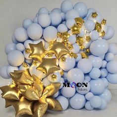 a bunch of balloons that are in the shape of stars