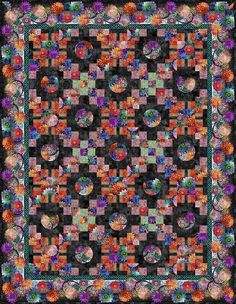 a square quilt with many different colors and designs on the front, along with an image of