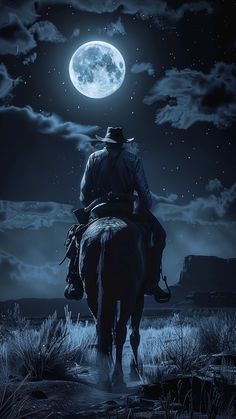 a man riding on the back of a horse under a full moon