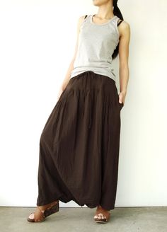 "🚚..ALL ORDERS ARE SHIPPED VIA DHL EXPRESS MAIL Too cool for words! A slighty a-line skirt with two front pockets, pleated front detail, adjustable drawstring at covered elastic waistband that can be worn on waist or hips and shell buttons at hemline of front and back, you can arrange it to be a harem pants. This 2 in 1 style can be worn as either a skirt or a harem pants. Made of our super fine cotton for easy comfort. Torn between fashion and comfort? Well, that's exactly the point. * flare s Casual Full Length Brown Skirt, Brown Full-length Maxi Skirt, Full Length Brown Relaxed Fit Skirt, Brown Full Length Skirt, Convertible Skirt, Long Maxi Skirt, Pants Skirt, Skirt Summer, Long Maxi Skirts