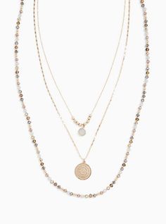 A three-tiered necklace is layered with multi beads at the bottom, a middle coin pendant tier, and a faux moon stone pendant top tier. Lobster clasp. 19-24. 5” length and 5” extender . Man-made materials. Imported. The best plus size women's multi bead & coin layered necklace necklaces in gold. Torrid is your destination for cozy fall and winter clothes to keep you warm and comfortable. Gold Layered Double Strand Beaded Necklaces, Gold Double Strand Layered Beaded Necklace, Gold Layered Double Strand Beaded Necklace, Adjustable Multi-strand Layered Beaded Necklace, Gold Multi-strand Layered Beaded Necklaces, Gold Layered Multi-strand Beaded Necklaces, Gold Layered Multi-strand Beaded Necklace, Adjustable Layered Necklace With Round Beads, Moon Stone Pendant