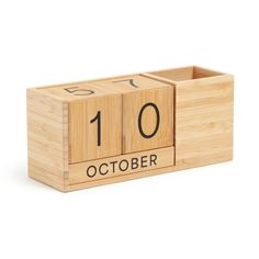 a wooden calendar with the date 10 on it