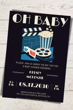 an old fashioned movie ticket card with the words oh baby on it and a popcorn bucket