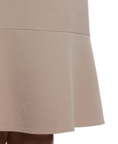 Take your office style up a notch with this essential A-line skirt from Rafaella. This women’s skirt has a flattering ruffled hem which added a bit of flounce and flourish to the knee-length style. Gabardine fabrication is tough and tightly woven which makes the style durable and gives its structure, while added stretch lets you move with ease and keeps you comfortable. Pair with the Plus Size Cropped Angled Open Blazer in Summer Straw or black. 62% Polyester / 33% Rayon / 5% Spandex Flattering Elegant Relaxed Mini Skirt With Ruffles, Elegant Flared Mini Skirt With Pleated Hem, Elegant Mini Skirt With Pleated Flared Hem, Elegant Flared Skirt Dress With Ruffle Hem, Elegant Flared Dress With Ruffle Hem, Elegant Dress With Ruffle Hem And Flared Skirt, Feminine Ruffled Skirt For Workwear, Knee-length Flowy Skirt With Ruffle Hem, Flowy Knee-length Skirt With Ruffle Hem