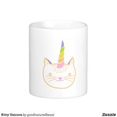 a white coffee mug with a cat wearing a unicorn horn