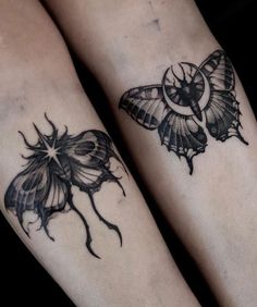 two butterfly tattoos on both legs, one is black and the other is grey with white accents