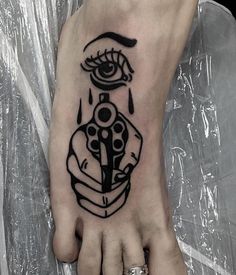 a person with a tattoo on their foot