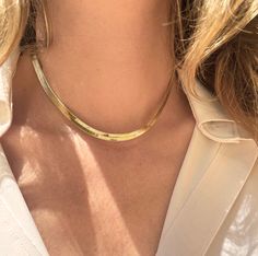 𝗚𝗢𝗟𝗗 SNAKE 𝗖𝗛𝗔𝗜𝗡 gold snake chain necklace. Perfect for everyday wear.  𝗗𝗘𝗧𝗔𝗜𝗟𝗦 𝗠𝗮𝘁𝗲𝗿𝗶𝗮𝗹: Gold plated (Lead Free, Nickel Free) 𝗖𝗵𝗮𝗶𝗻 𝗹𝗲𝗻𝗴𝘁𝗵: as pictured 16 inches/adjustable at the back Width: 6mm 𝗣𝗥𝗢𝗖𝗘𝗗𝗨𝗥𝗘 𝗜𝗡𝗙𝗢𝗥𝗠𝗔𝗧𝗜𝗢𝗡 Please select the length from the drop-down menu on the right side of the listing. 𝗦𝗛𝗜𝗣𝗣𝗜𝗡𝗚 𝗜𝗡𝗙𝗢𝗥𝗠𝗔𝗧𝗜𝗢𝗡 𝗙𝗿𝗲𝗲 𝗜𝗻𝘀𝘂𝗿𝗲𝗱 𝗦𝗵𝗶𝗽𝗽𝗶𝗻𝗴: The item will be gift wrapped and shipped with insured expres Gold Herringbone Chain, Gold Snake Chain, Herringbone Necklace, Gold Snake, Everyday Necklace, Snake Chain, Chain Lengths, Chains Necklace, Choker Necklace