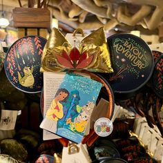 many disney mouse ears are on display at the store