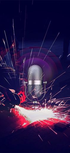 a microphone with sparks coming out of it