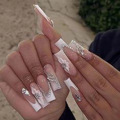 💅【White french tip press on nails】Our french acrylic nails are made of environmentally friendly ABS material, which is non-toxic, tasteless and will not hurt your hands. 💅【Fake nails for nail art】24 Pcs long square press on nails & a nail file & jelly glue stickers.(Durability of jelly glue is NOT as good as liquid glue, but it makes fake nails reusable. Please use suitable glue according to different scenes) 💅【Easy to Apply】Instead of spend a lot of time and money at nail salon, you can change your nails style in about 5 minutes anytime and anywhere.(The fake nails will stay longer if you clean your nails before use, and avoid water within the first hour of wearing) Latina Nails, Silver Nail Designs, Girly Acrylic, Silver Nail, Nagel Tips, Coffin Press On Nails, Stick On Nails, Rhinestone Designs, Artificial Nails