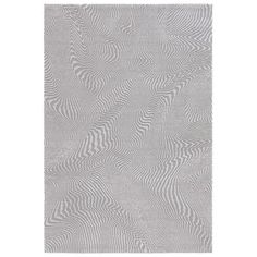 a gray rug with wavy lines on the bottom, and a white background in the middle