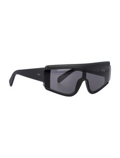 Elevate your style with the ZED Black Sunglasses by Retrosuperfuture. This all-black silhouette features dark, black lenses and a sleek logo print at the temples, giving you a bold and luxurious look. The curved tips add a touch of elegance, making these sunglasses the perfect accessory for any fashion enthusiast who appreciates high-quality designer goods. With a lens width of 6 cm and frame side of 14 cm, these sunglasses offer both style and functionality. Whether you're strolling through the Sleek Logo, Retrosuperfuture Sunglasses, Lens Logo, Shopping Places, Fashion Enthusiast, Medical Devices, Black Silhouette, Eyewear Brand, Sneaker Wedge