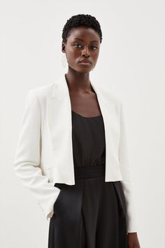 Timeless And Sophistication Combine With This Cropped Blazer, Crafted From Lustrous Satin That Is Tailored To Fit The Bodice For A Relaxed Fit. Cropped For An Alluring Touch, With A Notched Collar For Elegance. Pair This Piece With A Full Satin Skirt And Minimal Heels For A Youthful And Sophisticated Ensemble, Ready For Any Formal Soirée.Blazercroppedsatinlong Sleeves Cropped Blazer Outfit Classy, Satin Long Sleeve, Crop Blazer, Trending Sunglasses, Tailored Blazer, Cropped Blazer, Satin Skirt, Blazer Outfits, Knitwear Tops