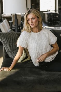 Cream Cotton Ruffle Sleeve Tops, Feminine V-neck Puff Sleeve Top With Ruffles, Relaxed Fit V-neck Top With Ruffles, Feminine Puff Sleeve Top With Ruffles V-neck, Relaxed Fit V-neck Ruffle Blouse, Black Ruffle Blouse, Denim Sweater, Woven Top, Black Ruffle