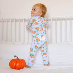 Your little one will enjoy cozy and comfortable nights in our Pumpkin Print Light Blue Gingham Zip Sleeper. These adorable sleeper feature a delightful pumpkin print, making them a fun and stylish choice for bedtime. Personalize them by adding a monogram to make them uniquely your baby's own. The easy zip-up front and secure back flap closure make dressing your little one a breeze. This footed sleeper keeps your baby's feet cozy and warm. It makes a wonderful baby gift and is a thoughtful way to Cute Pumpkin Patch Outfits, Pumpkin Patch Outfits, Light Blue Gingham, Pumpkin Patch Outfit, Beach Birthday, Street Kids, Girl's Back, Baby Swimming, Pumpkin Print