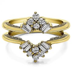 two yellow gold engagement rings with diamonds on each side and an open diamond set in the middle