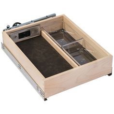 an open drawer with two trays in it