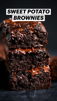 three chocolate brownies stacked on top of each other