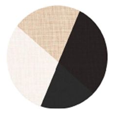 a black, white and beige circle with two different colors on the inside of it