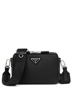 black leather enamel triangle logo top zip fastening adjustable detachable shoulder strap removable pouch internal slip pocket logo-embellished lining Designer Crossbody Shoulder Bag For Business, High-end Business Pouch Shoulder Bag, Designer Business Shoulder Bag With Detachable Strap, Designer Travel Shoulder Bag With Silver-tone Hardware, High-end Travel Shoulder Bag With Silver-tone Hardware, High-end Black Crossbody Shoulder Bag, High-end Travel Shoulder Bag With Zipper Closure, Business Shoulder Bag With Adjustable Strap In Saffiano Leather, Saffiano Leather Shoulder Bag With Branded Hardware