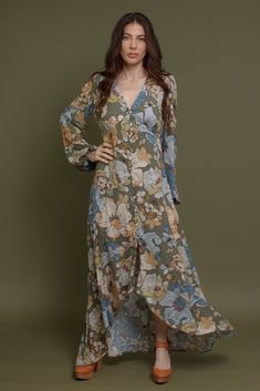 Brand: Promesa Long sleeve button front floral maxi dress with a high low hem. ♡ Details Color: Smoke Green Working button front High low hem Partially lined 100% Rayon Hand wash recommended Size & Fit Model Info: Height 5'3"| Bust 32"| Waist 25"| Hips 34" Model is wearing a size small Fit: Relaxed fit Stretch: No stretch Measurements: S: Bust 35" | Length 54" M: Bust 37" | Length 55" L: Bust 39" | Length 55" Spring Long Sleeve Maxi Dress With Button Closure, Fall Vacation Floral Print Maxi Dress, Floral Print Long Maxi Dress For Fall, Flowy Spring Maxi Dress With Button Closure, Long Sleeve Maxi Dress With Buttons For Brunch, Vacation Maxi Dress With Button Closure And Long Sleeves, Spring Floral Print Maxi Dress With Asymmetrical Hem, Floral Print Button-up Midi Dress For Vacation, Flowy Long Sleeve Ditsy Floral Maxi Dress