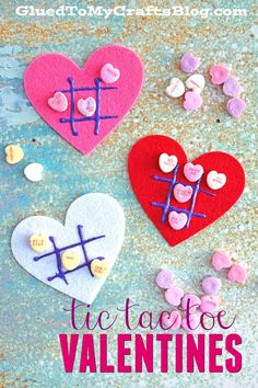 valentine's day craft for kids made with felt hearts and clothes pins on a blue background