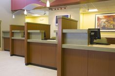 the front desk of an office building is empty