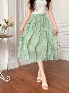 Elevate your spring-summer wardrobe with our High Waist Asymmetric Ruffled Maxi Skirt—a stylish and flattering ensemble designed for the modern woman. This chic skirt features an irregular asymmetric design with elegant ruffles, creating a trendy and unique silhouette. The high waist adds a slimming effect, making it a versatile and comfortable piece for various occasions. Crafted from high-quality fabric, this maxi skirt ensures durability and a soft, luxurious feel against your skin. Whether you're heading to a garden party, a summer event, or a casual outing, this Asymmetric Ruffled Maxi Skirt effortlessly captures the essence of spring-summer style with a blend of trendy design and comfort. Elevate your seasonal wardrobe with this must-have piece that complements your individual style, Maxi Skirt Summer, Ruffled Maxi Skirt, Maxi Skirt Spring, Cute Korean Fashion, Maxi Skirts Summer, Red Plaid Skirt, Long Skirt Summer, Chic Skirt, Elegante Y Chic