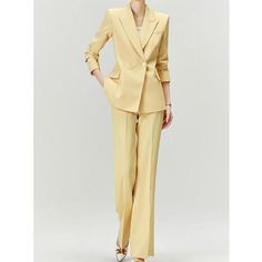 Discover Elegance and Professional Style Step into the office with confidence and style with our Elegant Yellow Pantsuit for Women. This chic and sophisticated two-piece set, featuring a long sleeve blazer and matching wide-leg pants, is the epitome of professional grace and modern fashion. Designed for the contemporary woman, this outfit seamlessly blends formal elegance with casual comfort, making it a versatile addition to your wardrobe. Exquisite Design and Quality Our pantsuit is crafted with meticulous attention to detail. The double-breasted blazer, with its sharp notched collar and full-length sleeves, pairs perfectly with the wide-leg pants, offering a slim and streamlined silhouette. The mid-waist design and flat front style ensure a flattering fit for all body types. The broadcl Yellow Pantsuit Women, Dragon Woman, Pantsuit For Women, Elegant Pants Suits, Yellow Office, Yellow Suit, Professional Style, Middle Aged Women, Gold Dragon