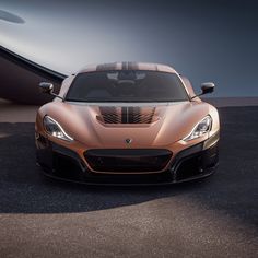 an orange sports car parked in front of a boat